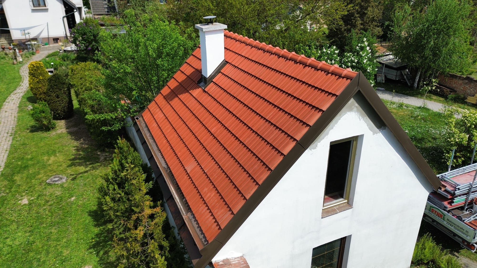Dachsanierung mit neuen und alten Dachziegeln